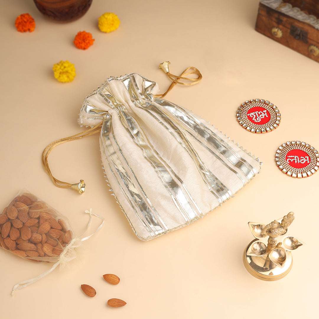 Brass Charan Paduka, Diya & Chowki Gift Festive Potli/Hamper - Image 4