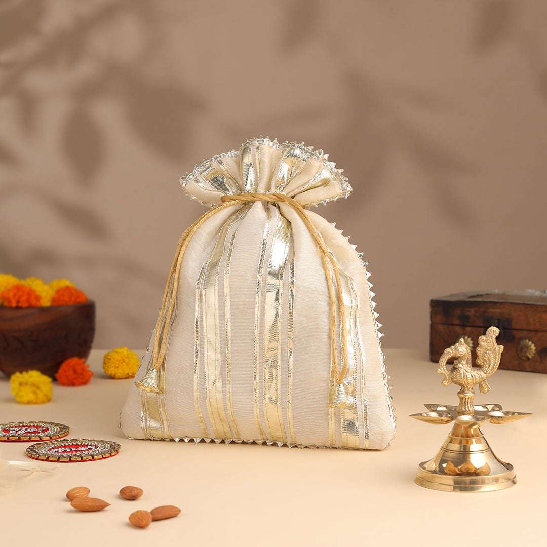 Brass Charan Paduka, Diya & Chowki Gift Festive Potli/Hamper - Image 5