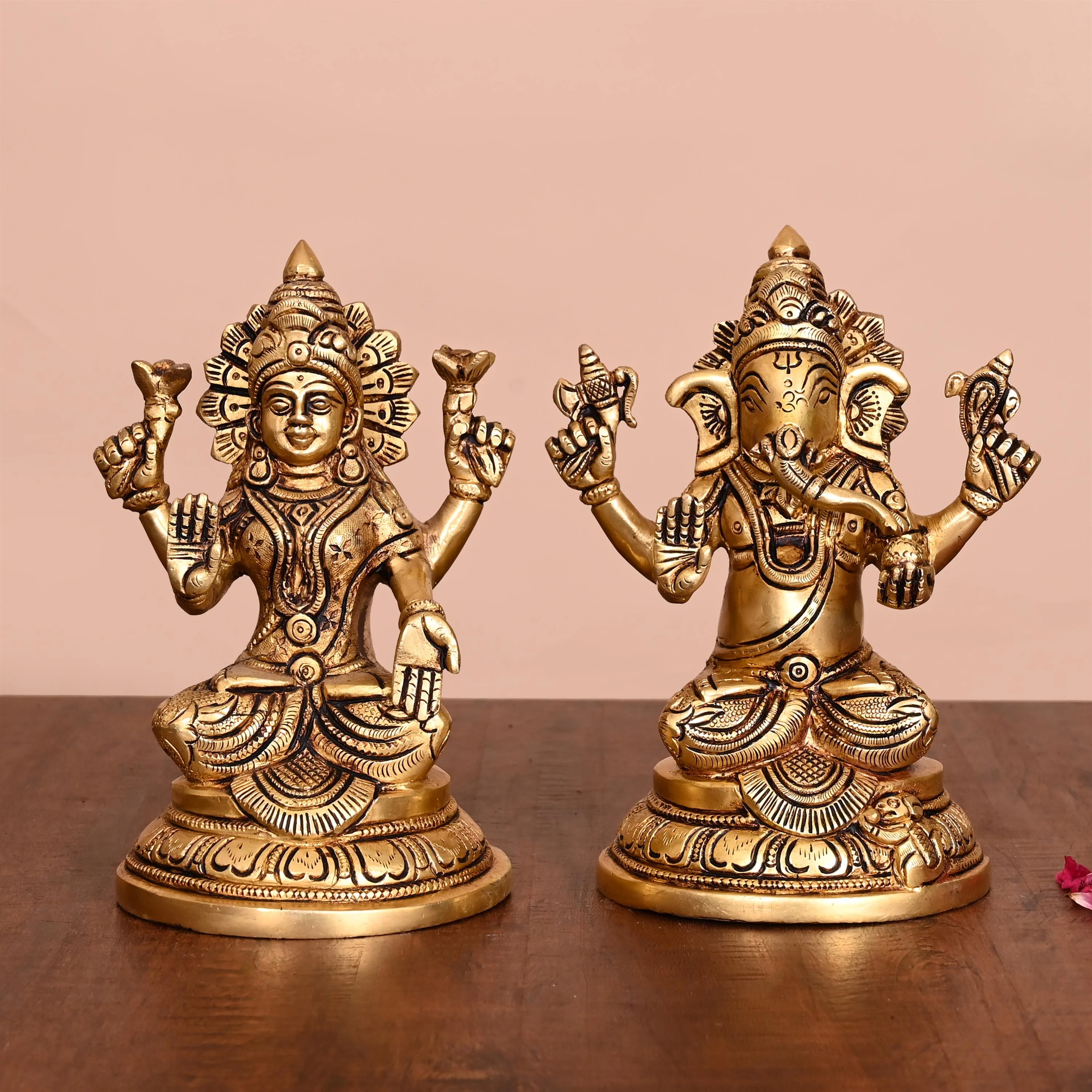 Brass Sitting Ganesha And Lakshmi Idols (6.8 Inch)