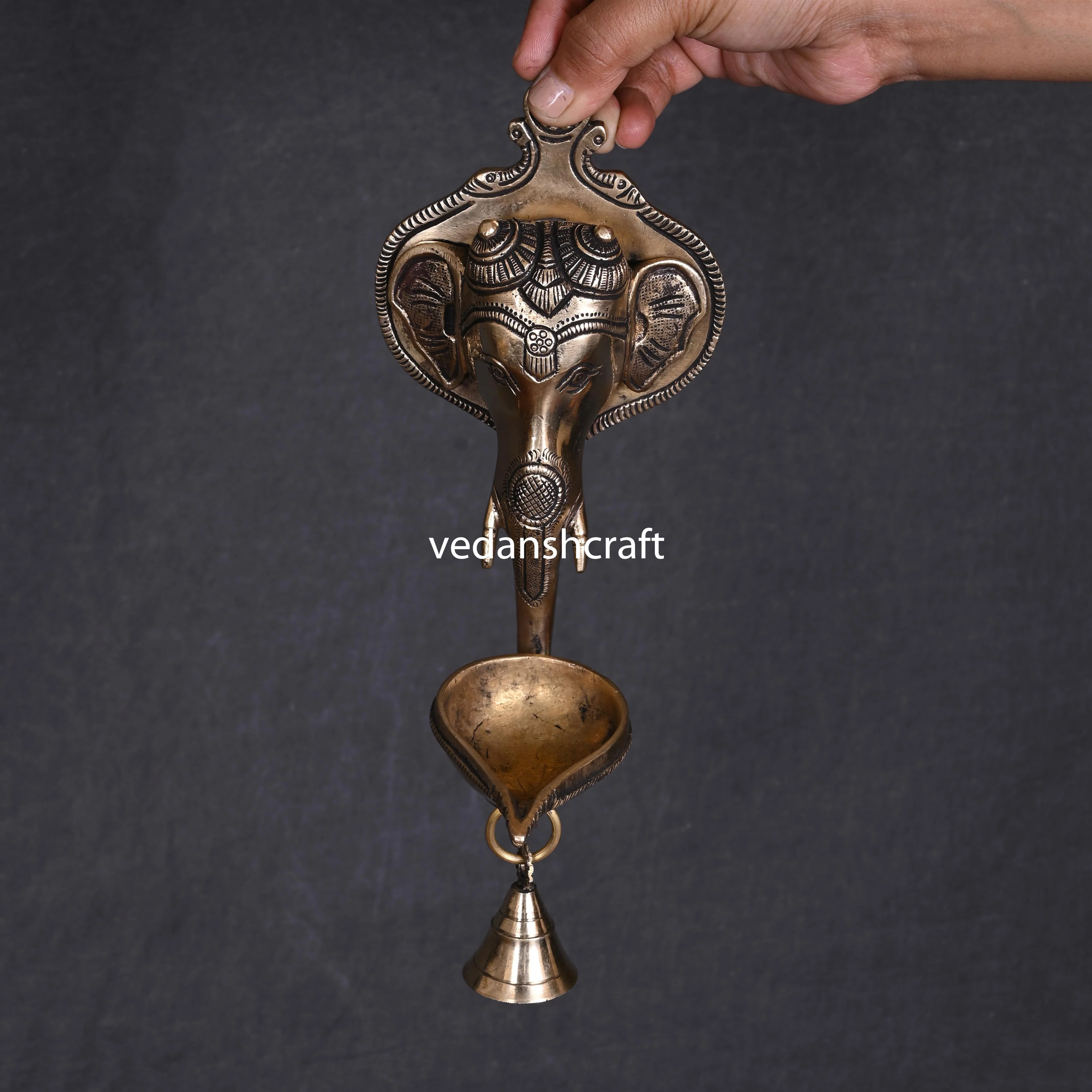 Brass Ganesha Face With Diya & Bell Wall Hanging (10 Inch) - Image 2