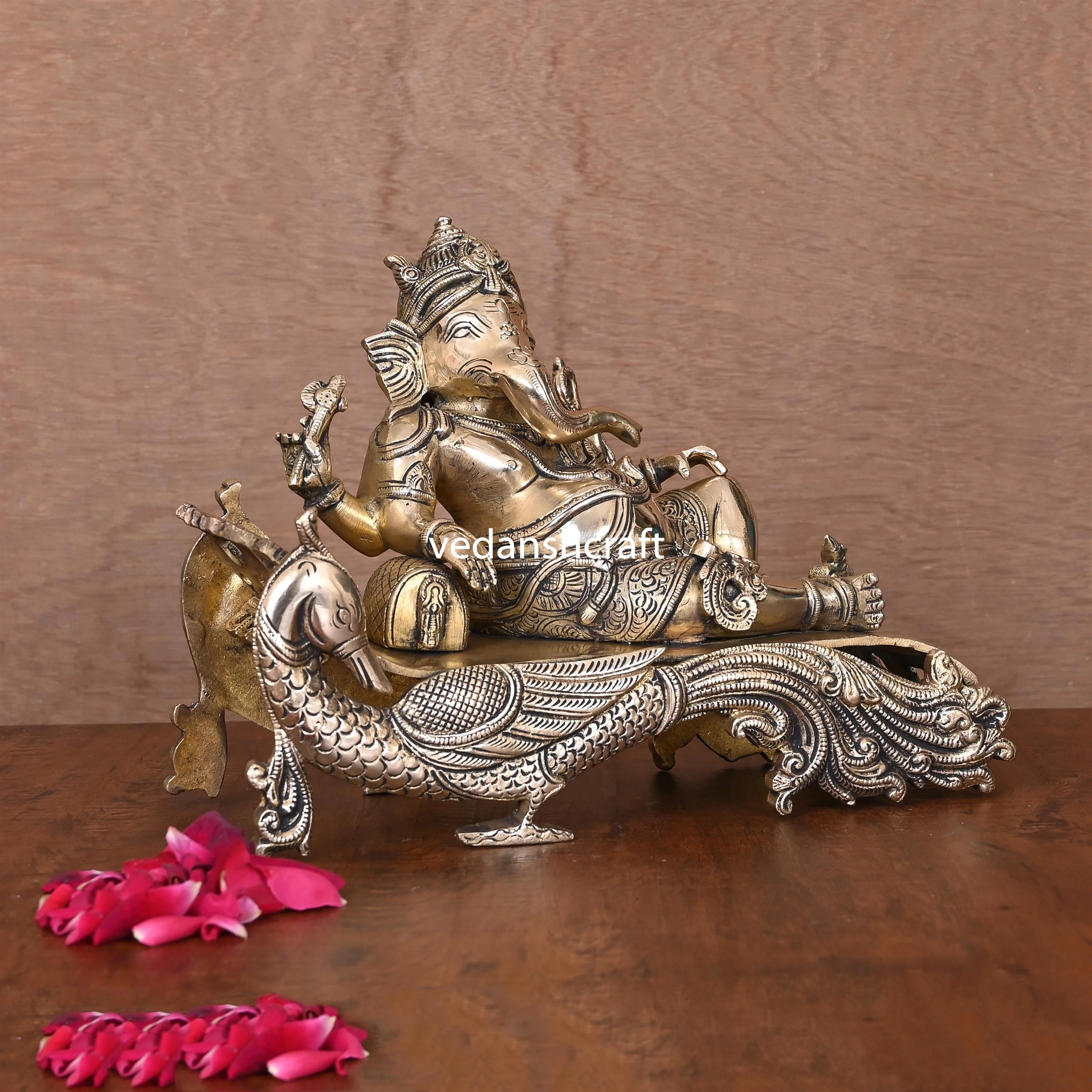 Brass Ganesha Resting On Peacock Couch (7.7 Inch) - Image 3