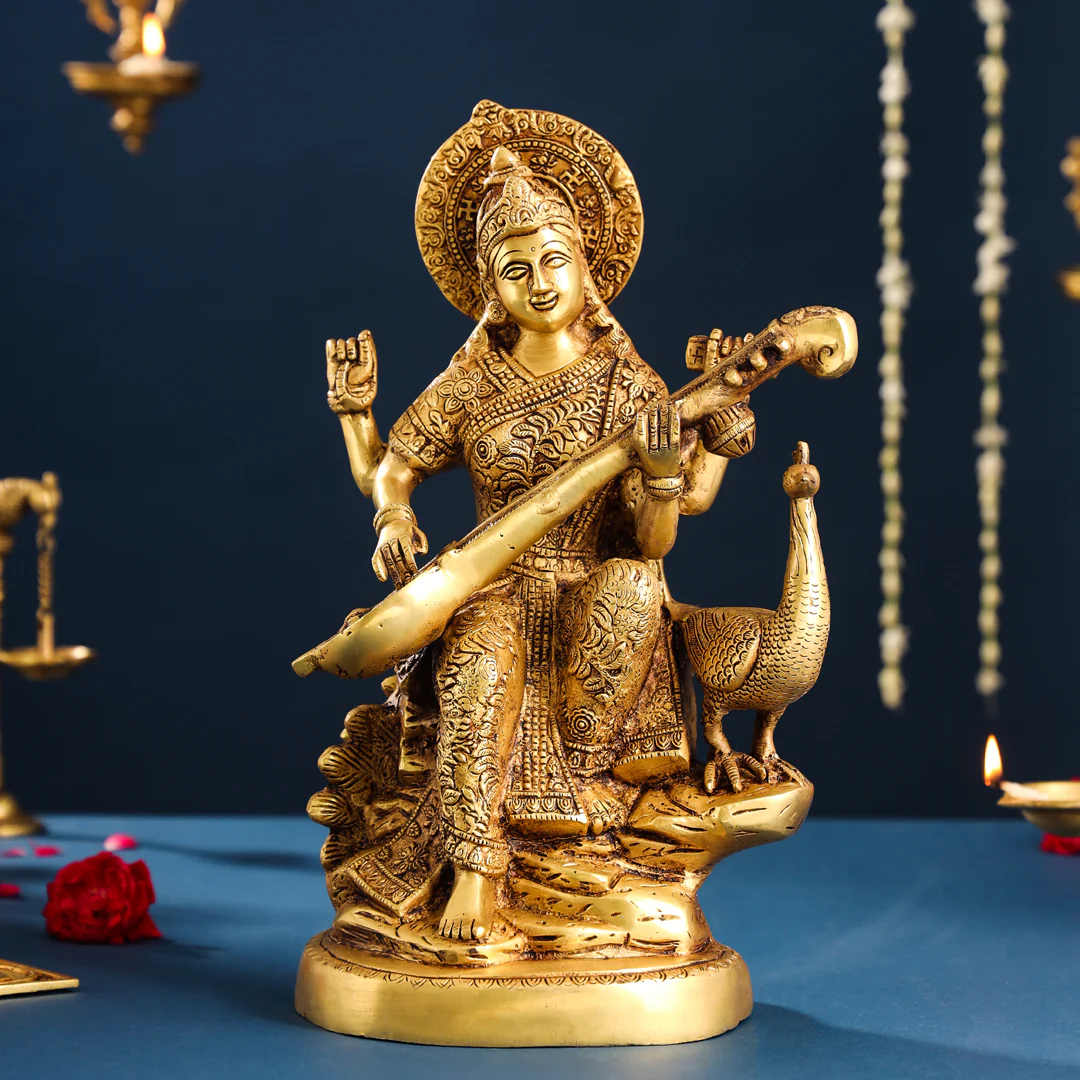 Brass Goddess Sitting Saraswati With Peacock Figurine (15 Inch)