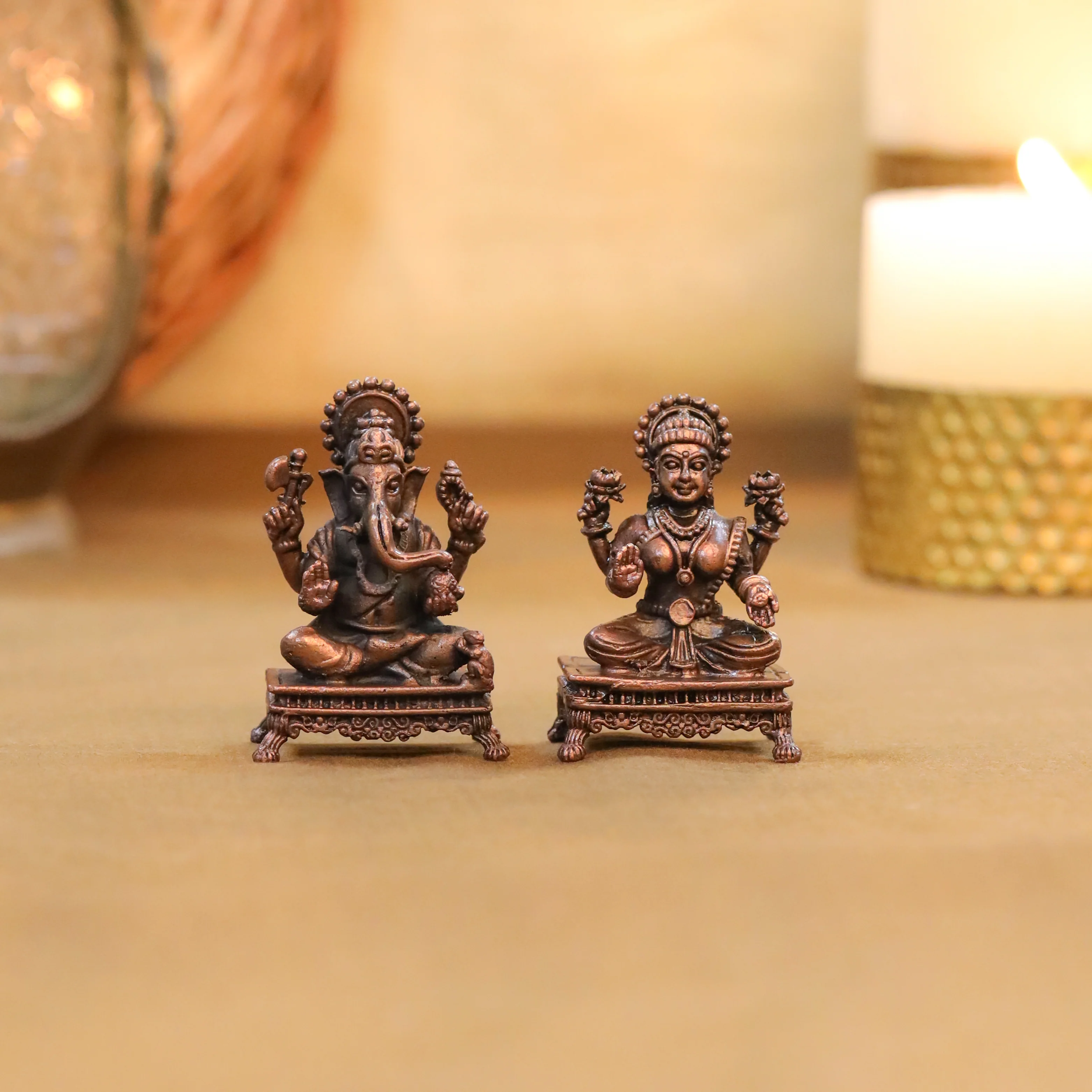 Copper Sitting Ganesha And Lakshmi Idols Set (2.5 Inch)