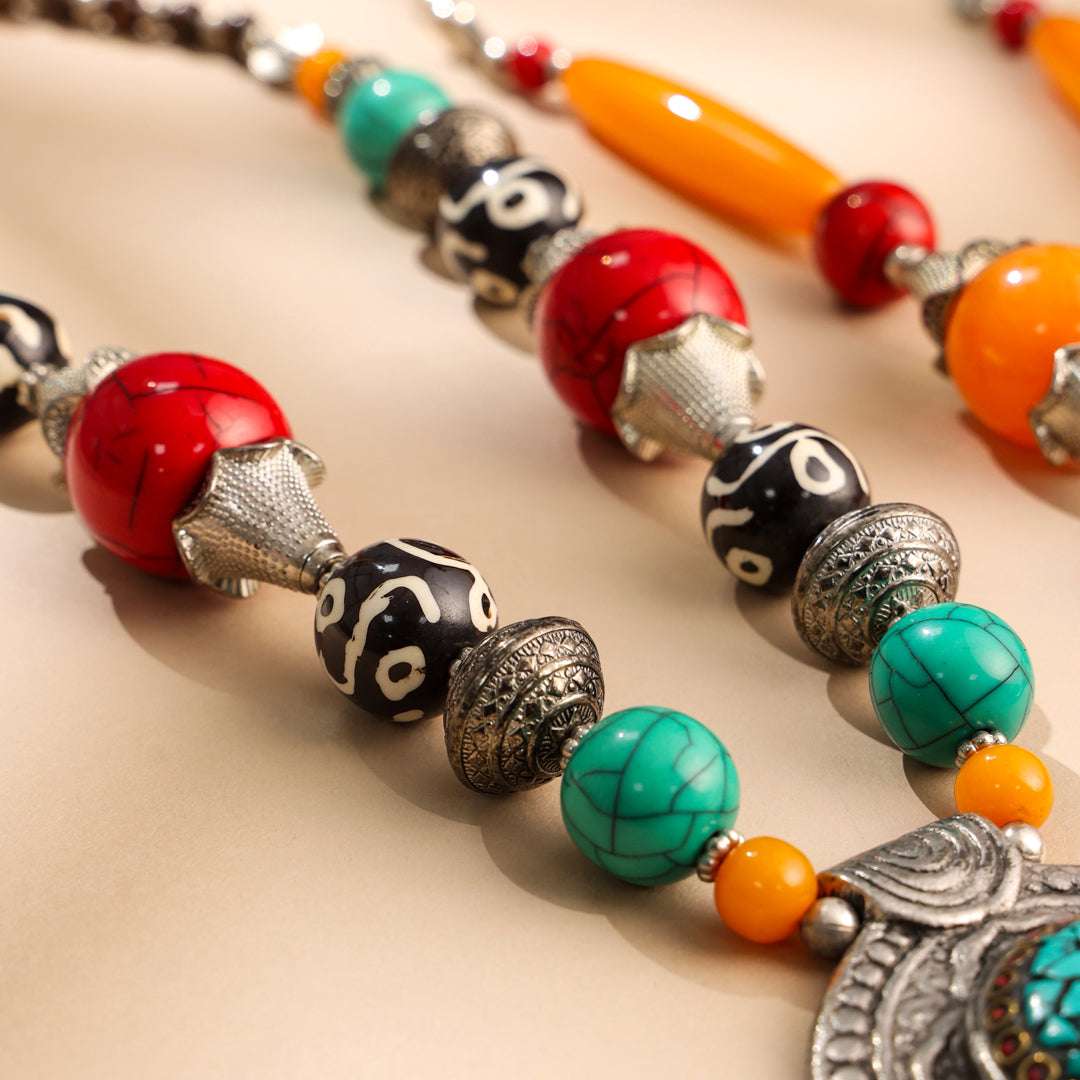 Resin Boho Orange Bead Necklaces with Tribal Silver Pendants - Image 6